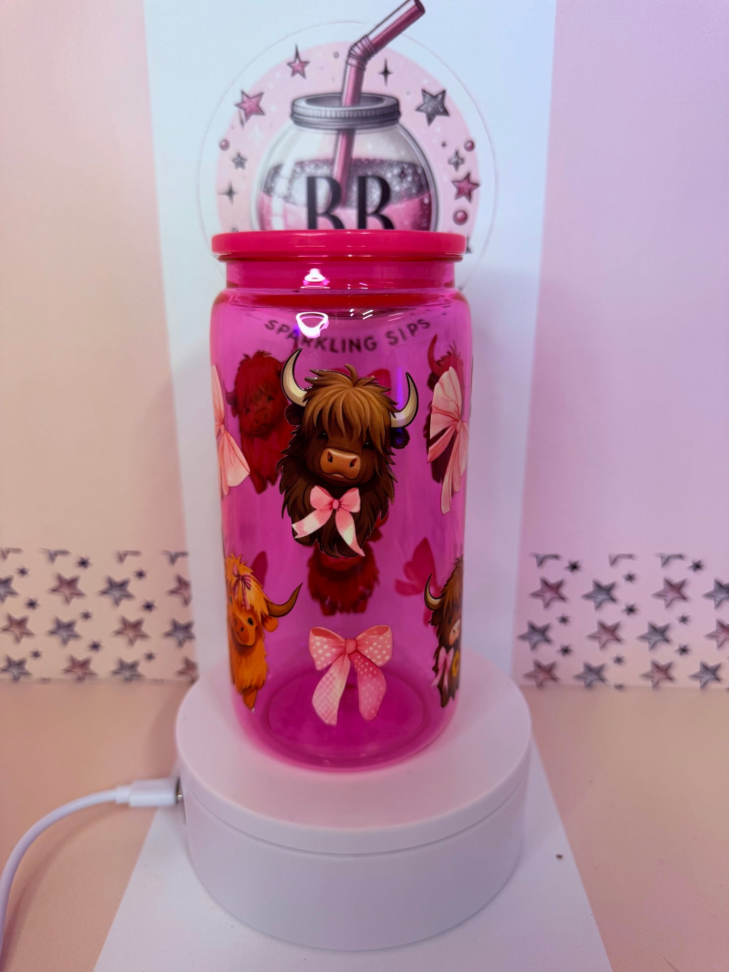 Bright pink 16oz acrylic Highland Cow & Bows coloured cup